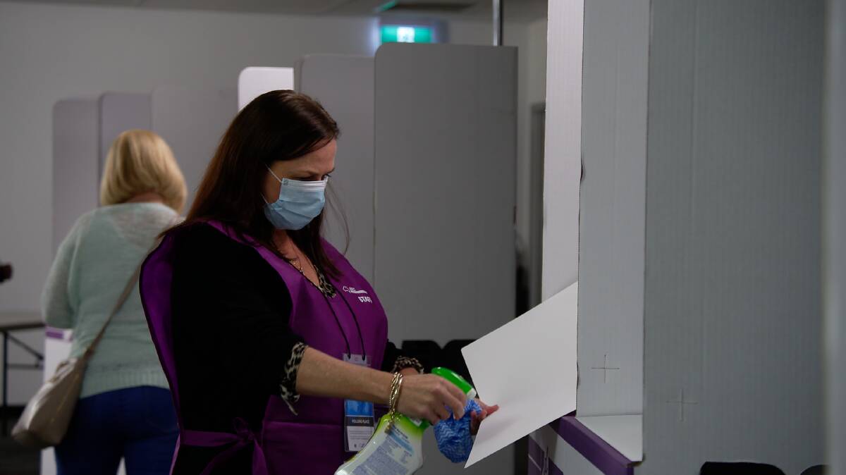 Added cleaning: Special mats placed in cardboard voting booths will be regularly wiped between uses as part of the coronavirus measures adopted. Picture: AUSTRALIAN ELECTORAL COMMISSION