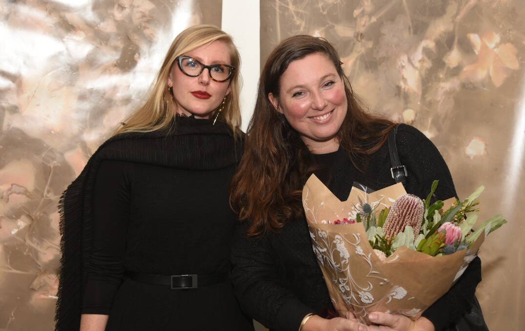Success captured: Judge Isobel Parker Philip with photographer Amanda Williams after announcing she had won the National Photography Prize. Picture: JULES BOAG 