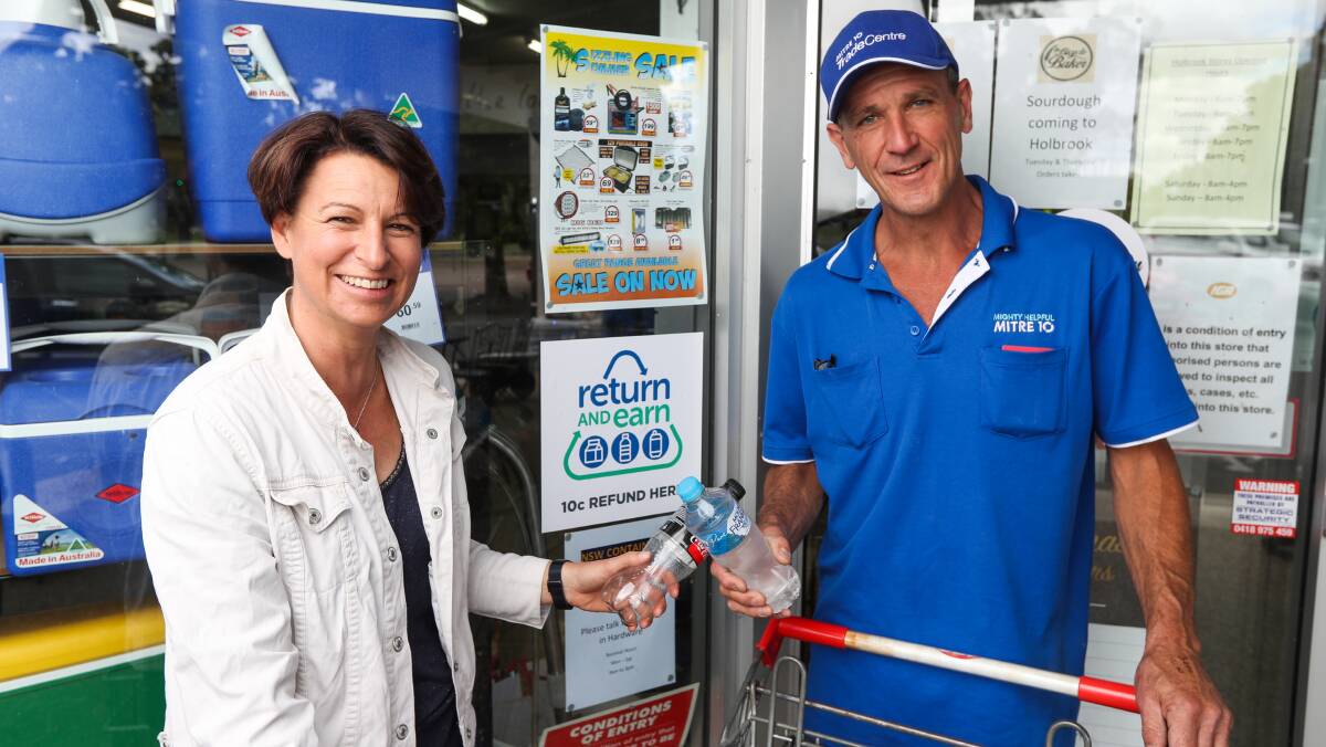 Ready for returns: Holbrook IGA and Mitre 10 owner-manager Vicky Geddes with hardware employee Paul Lukins who will be involved in collecting bottles as part of the Return and Earn scheme. Picture: MARK JESSER