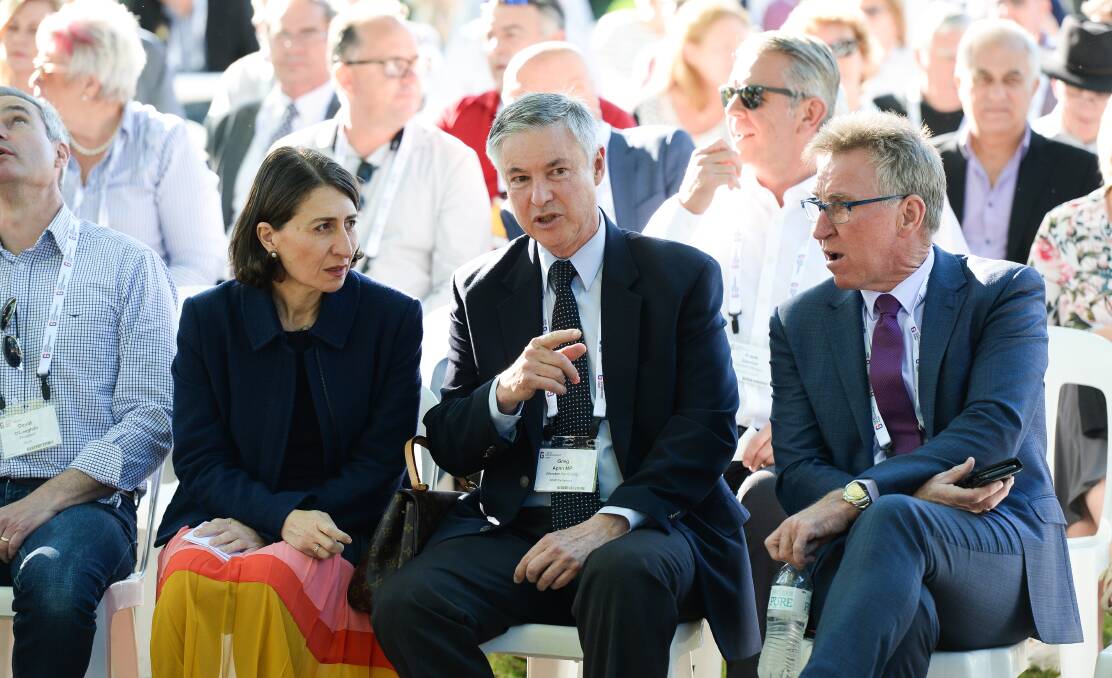 Three decision makers: NSW Premier Gladys Berejiklian, member for Albury Greg Aplin and Albury mayor Kevin Mack chat during opening proceedings for the NSW Local Government Conference which is being held on the Border this week. Picture: MARK JESSER