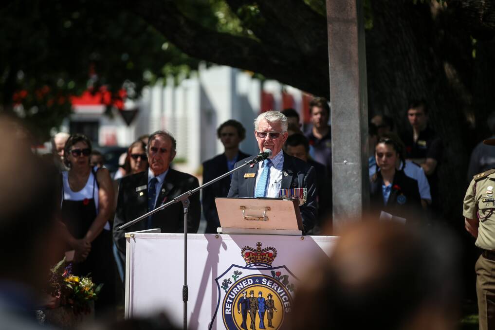 At the helm: Wodonga RSL sub-branch president Kevyn Williams addresses last year's Remembrance Day ceremony in his city. He believes a division among the RSL members has done irreparable damage.
