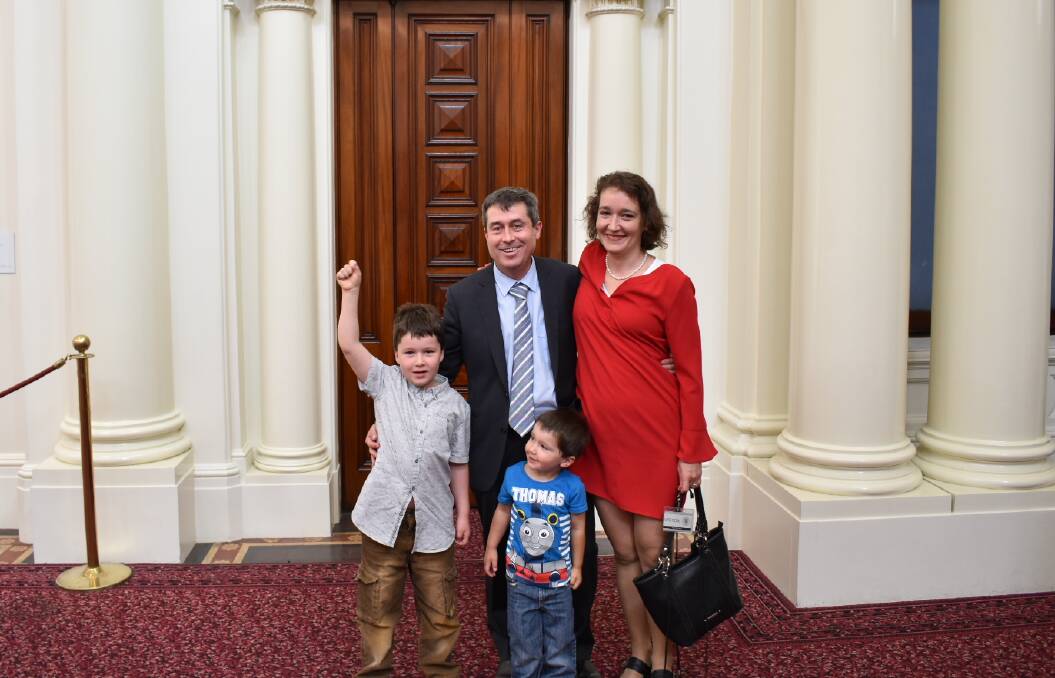Big day: Tim Quilty with wife Olga and sons Fred and Misha following his maiden speech to parliament on Tuesday afternoon.