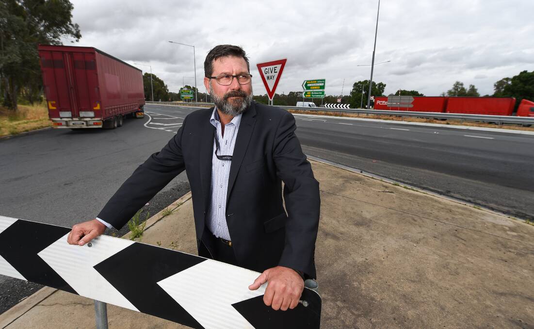 Cynical: Bill Tilley at the intersection of the Hume Freeway and McKoy Street on Friday. He has raised doubts about the Victorian government's commitment to working swiftly to have a flyover erected at the site. Picture: MARK JESSER