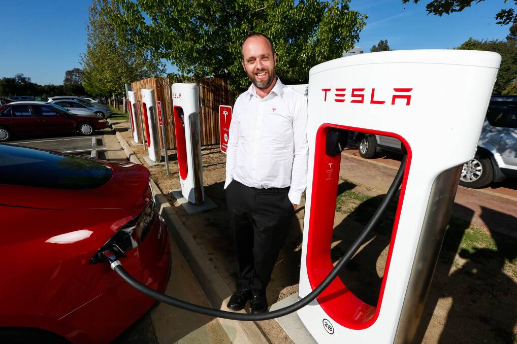 On the charge: A Tesla electric car is rezapped at the Wodonga charging station which opened in October, 2015.