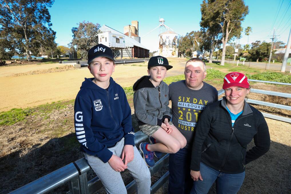 Holidaying: The Parker family, out of Melbourne's Hoppers Crossing at Goorambat. From left Josh, 11, Liam, 9, dad Tim and mum Penny. Picture: JAMES WILTSHIRE