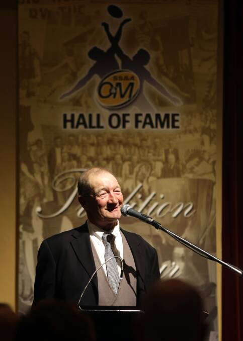Proud moment: Jack Clancy gives his acceptance speech after being inducted into the Ovens and Murray Hall of Fame in 2009.