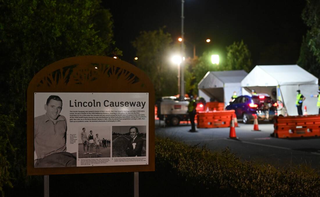 The sign paying tribute to Merv Lincoln, who gives his name to the causeway between Albury and Wodonga, was a backdrop to a border checkpoint during COVID. Picture by Mark Jesser