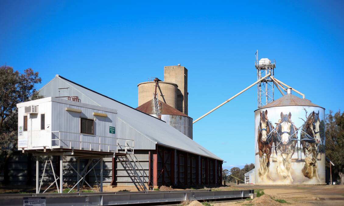 Loading up: Silos alongside the Benalla to Oaklands line at Goorambat. Storages are expected to be brimming with a big grain harvest this year. Picture: JAMES WILTSHIRE