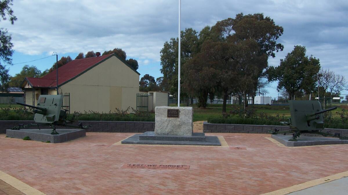 Military connection: A war memorial sits near the former RSL building at Oaklands.