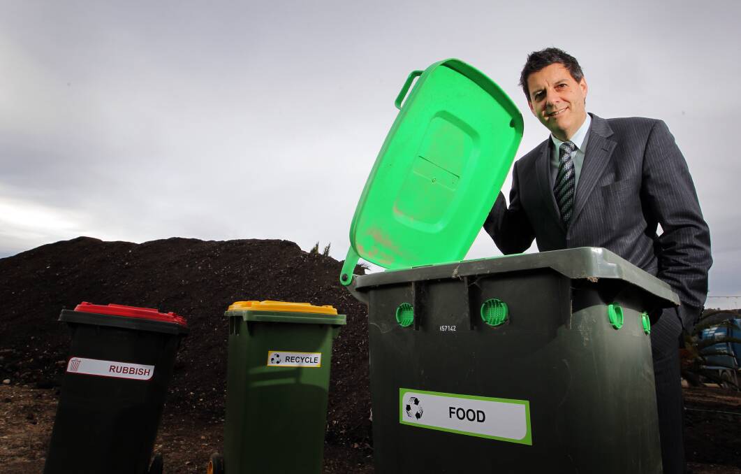 Flashback: Then Wodonga council manager Trevor Ierino, who is now Indigo Council chief executive, at the time an organics bin was introduced to the city in 2012.