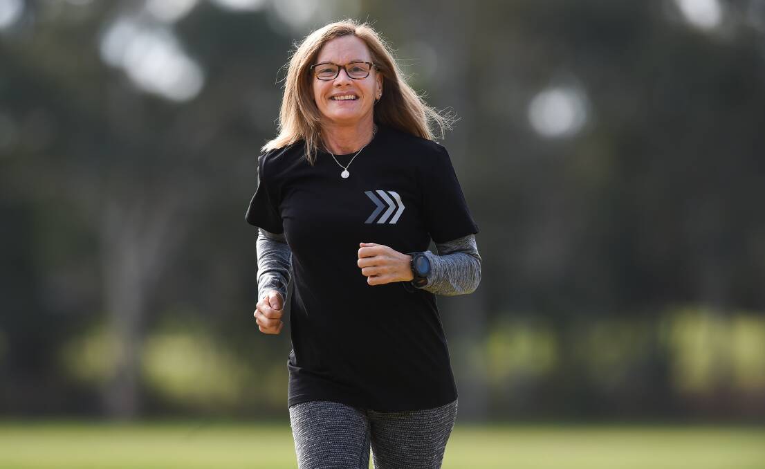 Getting into stride: Ange Ednie shows her motion as she prepares for the parkrun. Picture: MARK JESSER