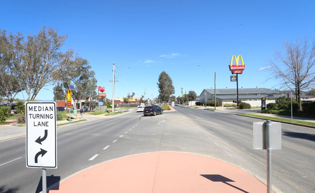 Likely site: A security camera has been proposed for the area on the left of this photo of Wagga Road at Lavington, so it would face towards the entrance of McDonald's. Picture: JAMES WILTSHIRE