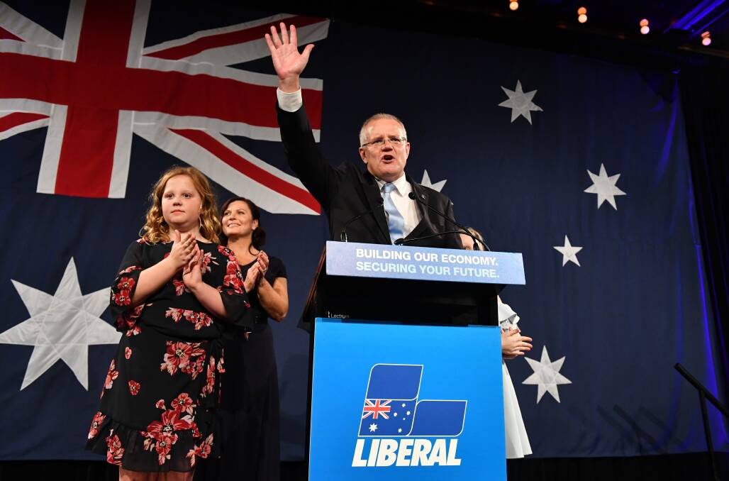 Moment of triumph: Scott Morrison with his wife Jenny and children celebrate his election win on Saturday night.
