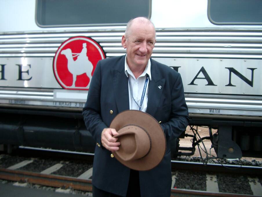 Taste for trains: Tim Fischer with The Ghan on its inaugural trip from Adelaide to Darwin in 2004 following its extension from its previous terminus at Alice Springs. 