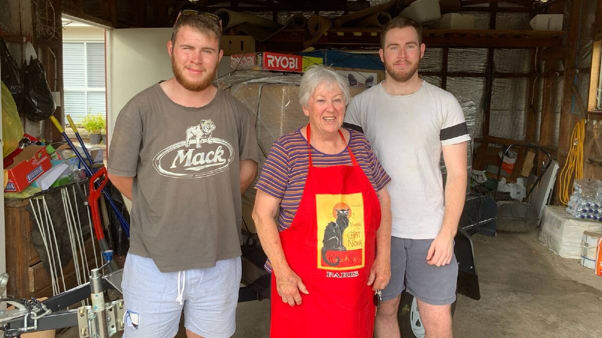 Windfall: Judy Tuckwell and her grandsons Jakob and Brayden Keddie in front of the trailer load of goods she won in a raffle to support a charity Kokoda trek.