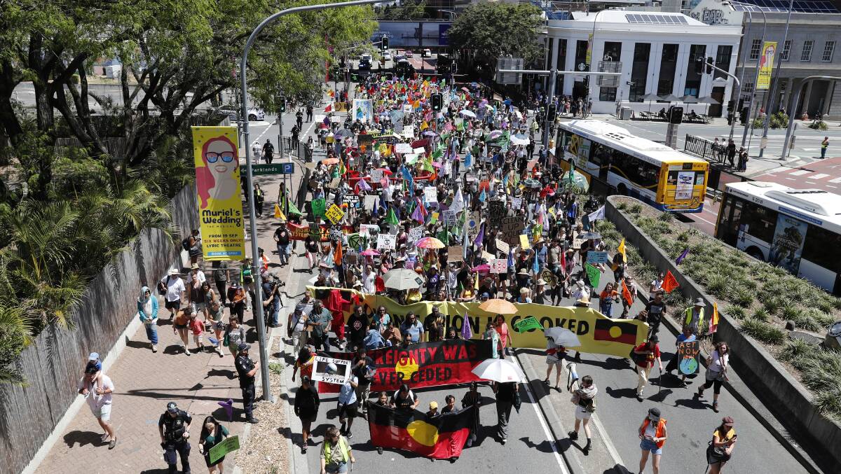 On the march: Extinction Rebellion protesters in Brisbane who frustrated Home Affairs Minister Peter Dutton.