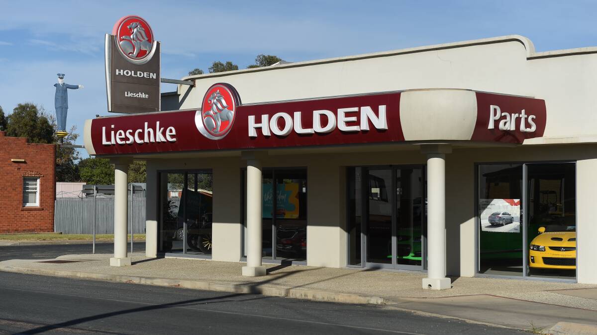 On way out: Holden signs a staple at dealers around Australia, such as Lieschke at Walla, are set to disappear after US parent company General Motors' decision to end the brand name and dealer sales. 