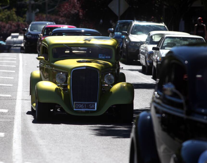 Popular: A long line of hot rods descend on Bright for the town's big automotive celebration each November.