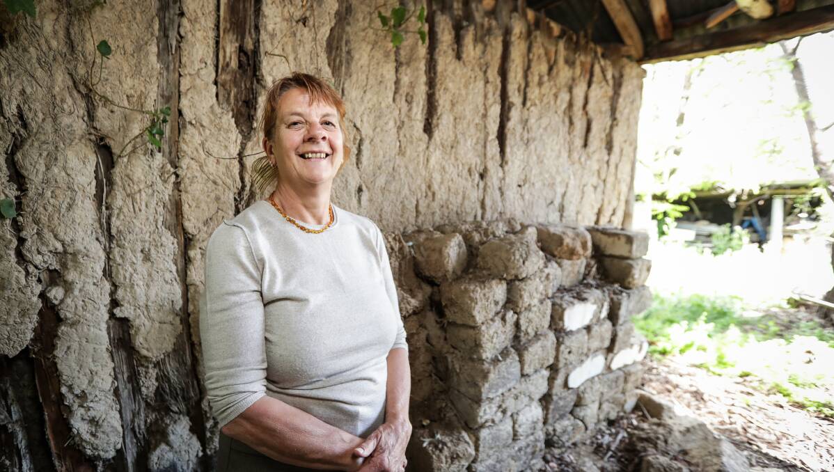 Delighted: Marg Wehner at the stables used by her father Ern. They and the nearby blacksmith's shop will be restored. Picture: JAMES WILTSHIRE 