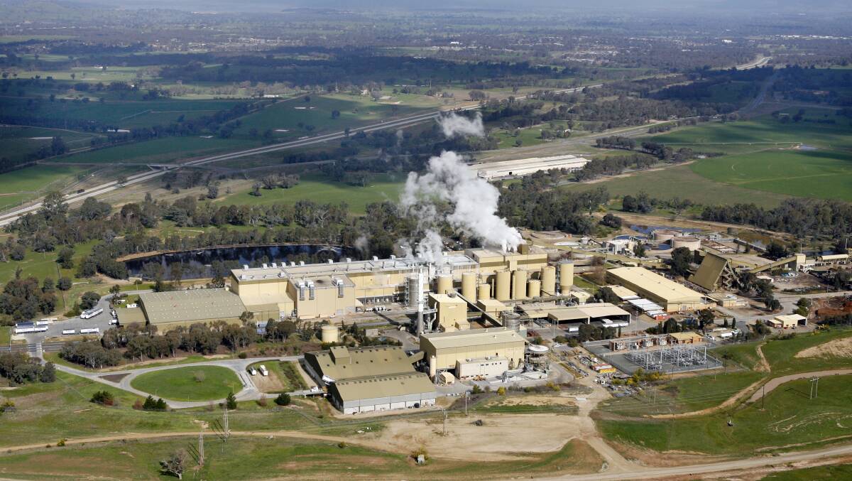 Part of the landscape: An aerial view of the paper mill which was built strategically next to the Hume Highway for easy transport access. 
