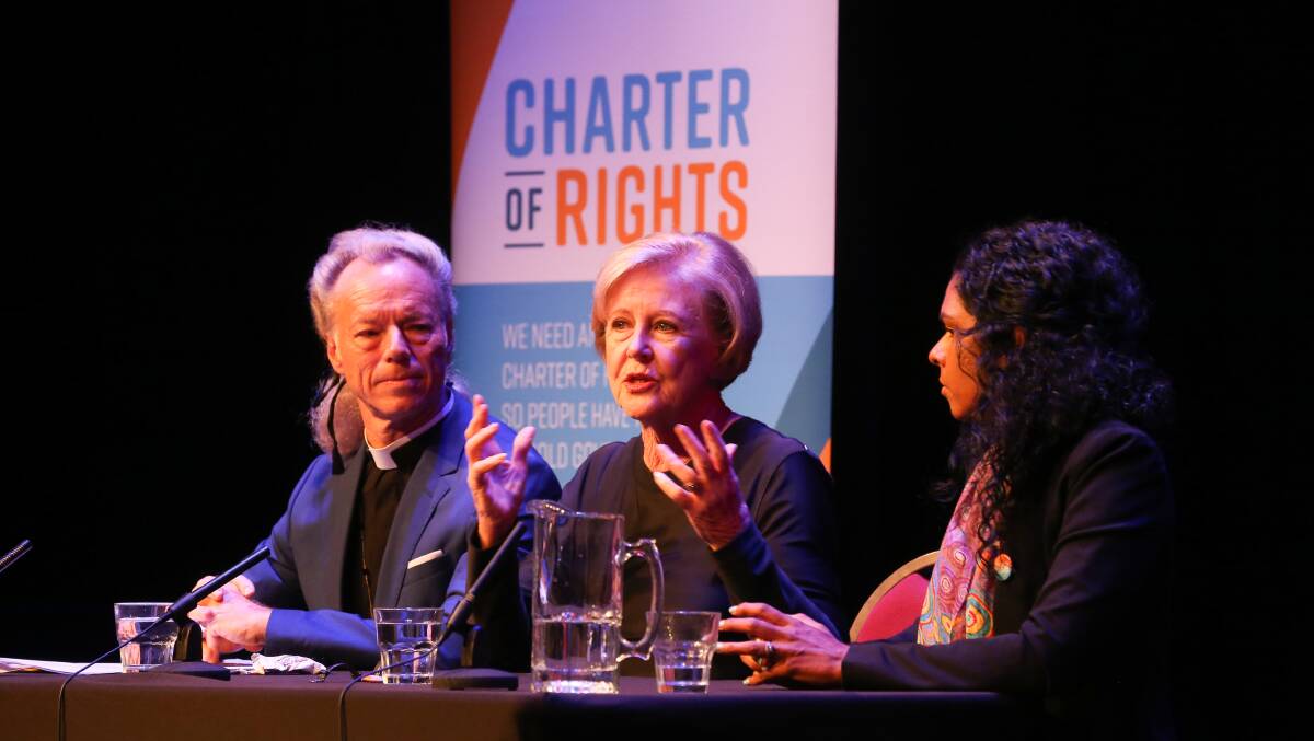 Making a point: Gillian Triggs speaks at Thursday night's forum at Wangaratta while Father MacLeod-Miller and Indigenous rights proponent and lawyer Teela Reid listen. Picture: KYLIE ESLER