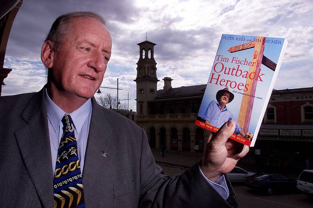 Published author: Tim Fischer with his book Outback Heroes at its Beechworth launch in 2002.