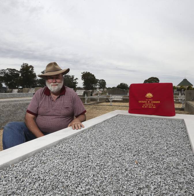 Mission accomplished: David Valentine with a cover on the headstone for Private Lundgren which will be lifted in Friday's ceremony. No photograph of the soldier has been found. Picture: ELENOR TEDENBORG