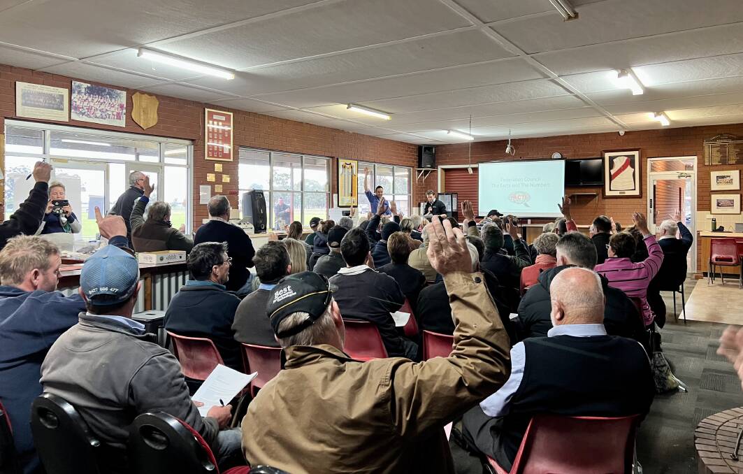 Hands up who's unhappy: Disgruntled Federation Shire residents from Urana to Rennie to Coreen gather on Wednesday afternoon.