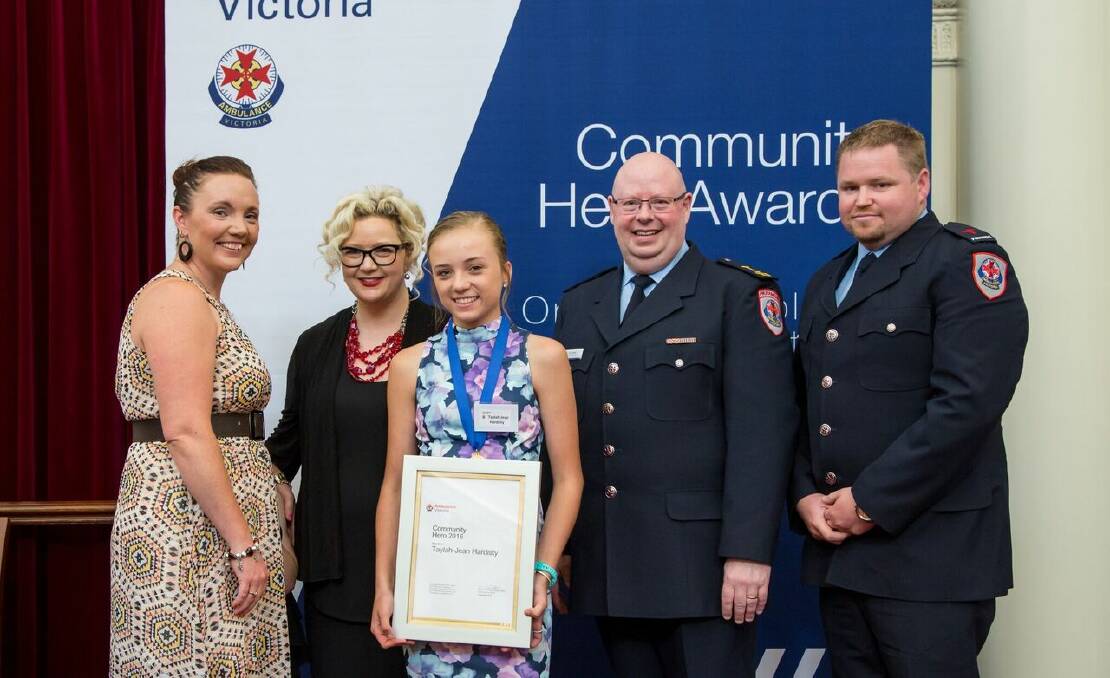 Hero: Teenage rescuer Taylah-Jean Hardisty surrounded by her mother Melinda Hardisty, Victorian Health Minister Jill Hennessy, Ambulance Victoria chief executive Tony Walker and Wodonga paramedic Nathan Ashcroft after receiving her award.
