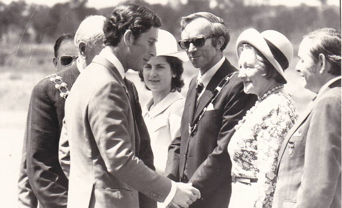 Royal touch: Jean Riley meets Prince Charles at Albury airport in October 1974 as part of an official party that included her husband Ken, the then Wodonga mayor who was alongside her wearing his mayoral chain. 