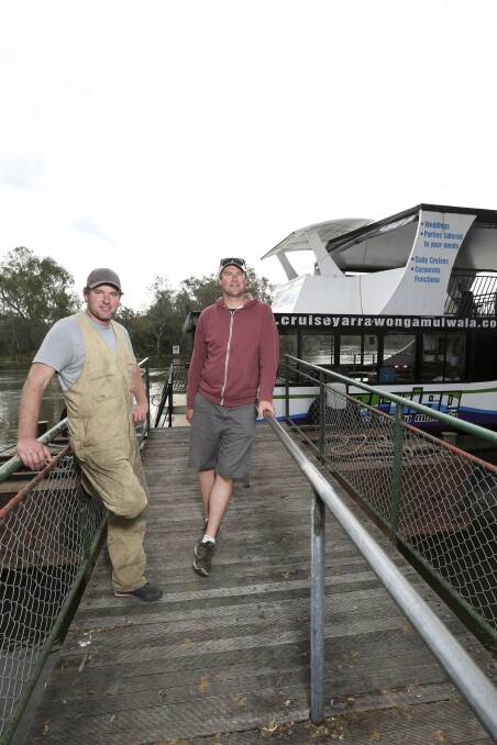 FLASHBACK: Brothers Robbie Knowles and Fraser Knowles in 2016 with the Sienna Daisy at the former Cumberoona boat ramp on the Murray River in Albury.