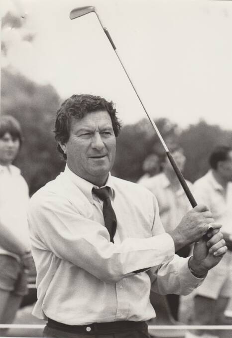 Keeping watch: Peter Thomson tees off in the hole-in-one competition held on the opening day of Thurgoona golf club in February 1982. His shot fell short of the hole so he missed out on collecting a $7000 Ford Laser prize.