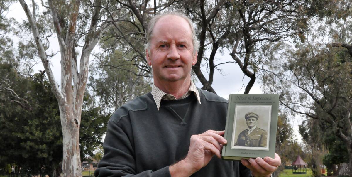 Hero recognised: Brad Chalmers with a copy of his biography of Victoria Cross winner Albert Borella. Picture: DENILIQUIN PASTORAL TIMES
