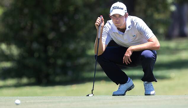 Flying: Zach Murray assesses a putt at Brisbane Golf Club on his way to a 65 and the lead in the opening round of the Queensland Open.