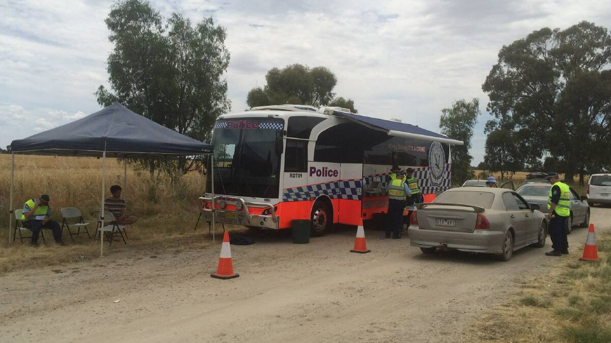 Flashback: NSW police conduct drug and alcohol testing outside the Strawberry Fields Festival at Tocumwal in 2016.