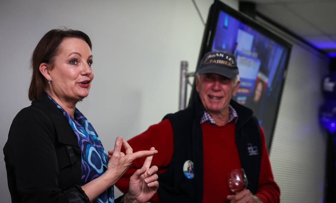 Celebratory mode: Sussan Ley thanks the Liberal Party faithful, including her mentor Angus Macneil, at her party in an Albury office in Swift Street on Saturday night. 