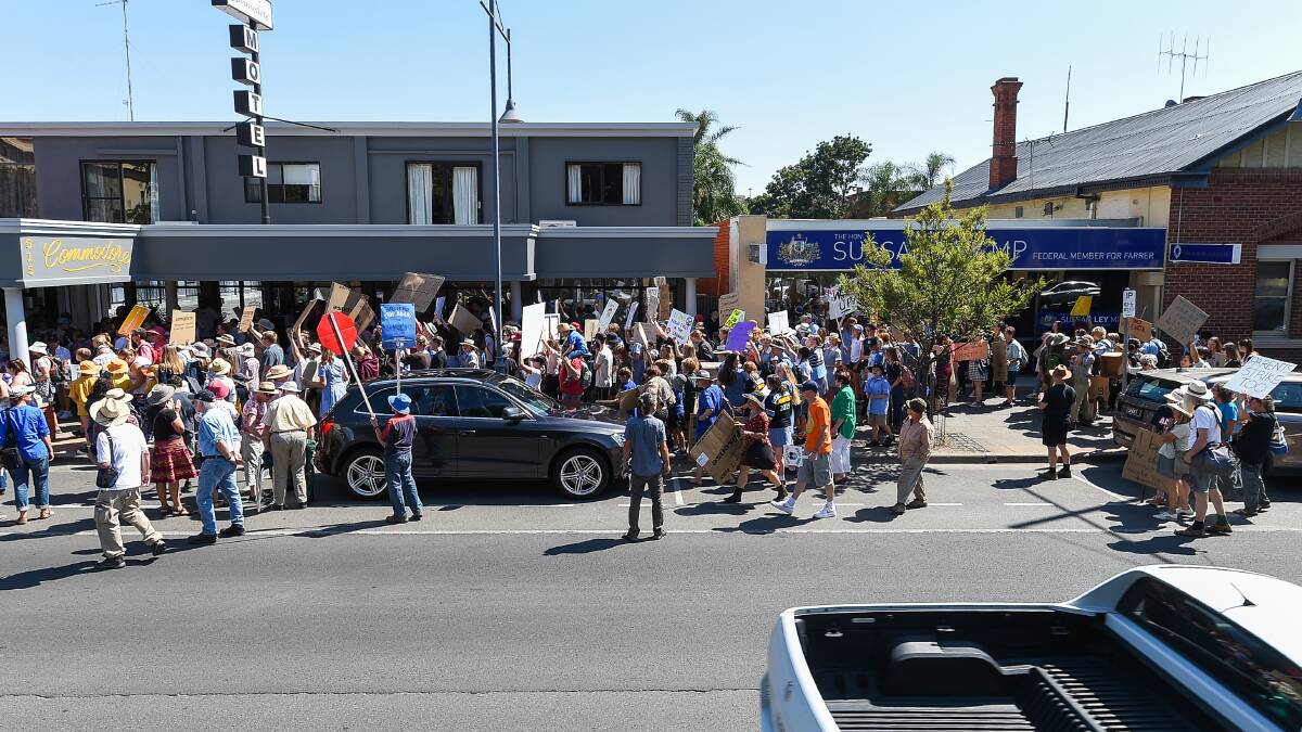 Focal point: Climate change protesters in a student strike earlier this year gather outside Sussan Ley's Albury office. Picture: MARK JESSER 