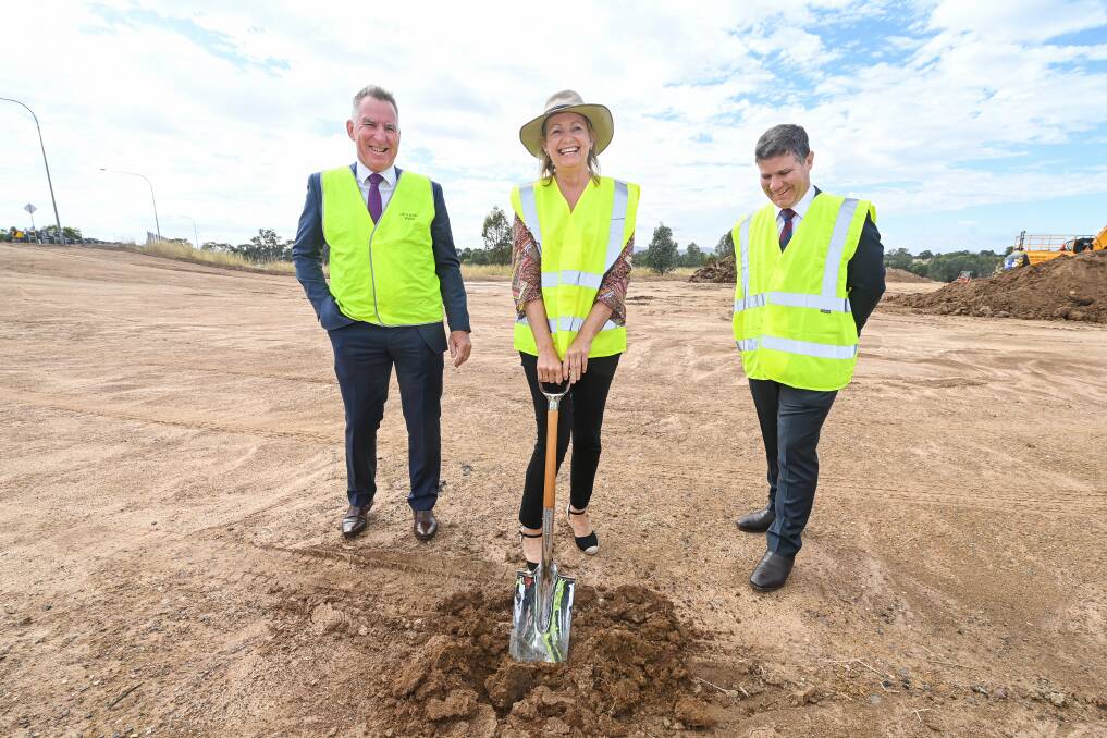 Formality: Sussan Ley was given the honour of turning the first sod on the Davey Road upgrade with Kevin Mack and Justin Clancy looking on. Picture: MARK JESSER