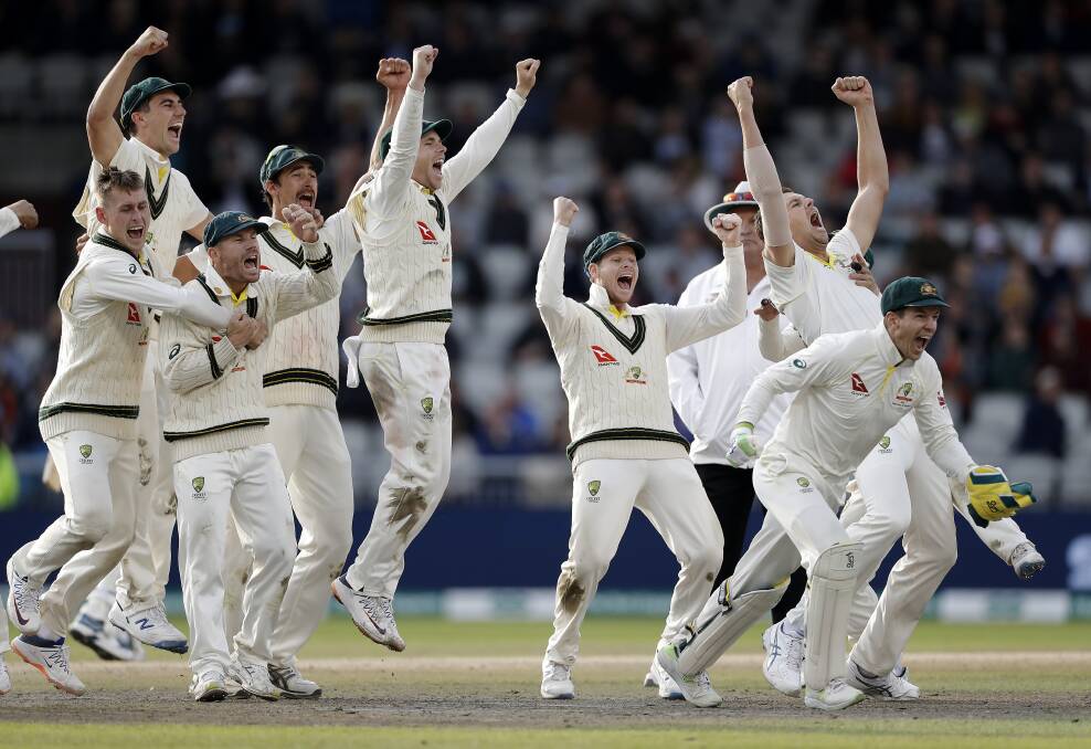 Yahoo: The moment of victory. Australia's players celebrate as they win the fourth Test against England at Old Trafford. 