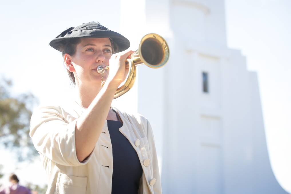 Special day: Verity Cotter with her bugle following yesterday's services on Albury's Monument Hill at which she made her debut. Pictures: JAMES WILTSHIRE