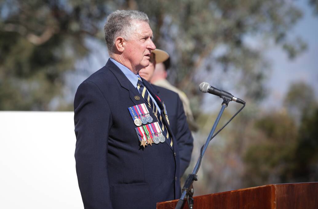 Veterans' voice: Graham Docksey giving an Anzac Day address at the war memorial.