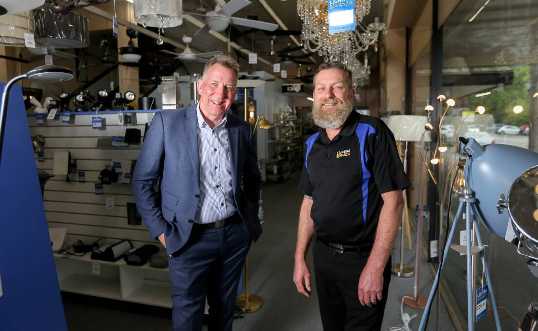 Back them in: Albury mayor Kevin Mack is urging consumers to get out and support traders such as Stephen Porter, who owns Lighting Bonanza in Dean Street. Picture: TARA TREWHELLA