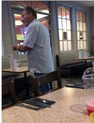 At large: A Facebook image showing Jeremy Kewley in the dining room of the Old Town and Country Tavern in Wangaratta. 
