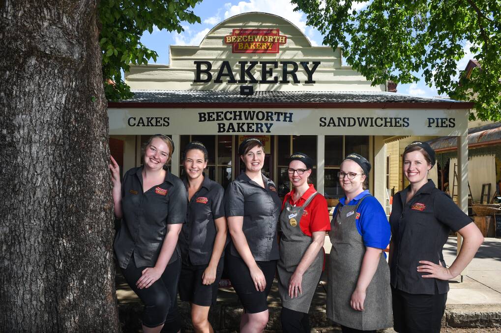 Ready to serve: Beechworth Bakery Yackandandah store manager Laura Harris with staff members Jo Matassoni, Holly Mendham, Melissa Rudolph, Lisa Waite and Bec Bachelor outside the newly made over premises. Picture: MARK JESSER
