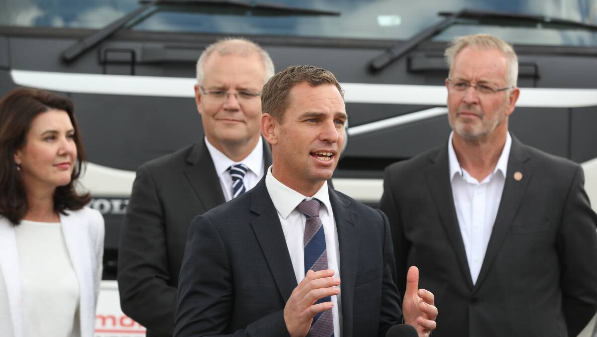 Promises, promises: Liberal candidate Steve Martin speaks about McKoy Street funding while Senator Jane Hume, Prime Minister Scott Morrison and Nationals candidate for Indi Mark Byatt look on at the Ron Finemore Transport depot in Wodonga on Tuesday. 