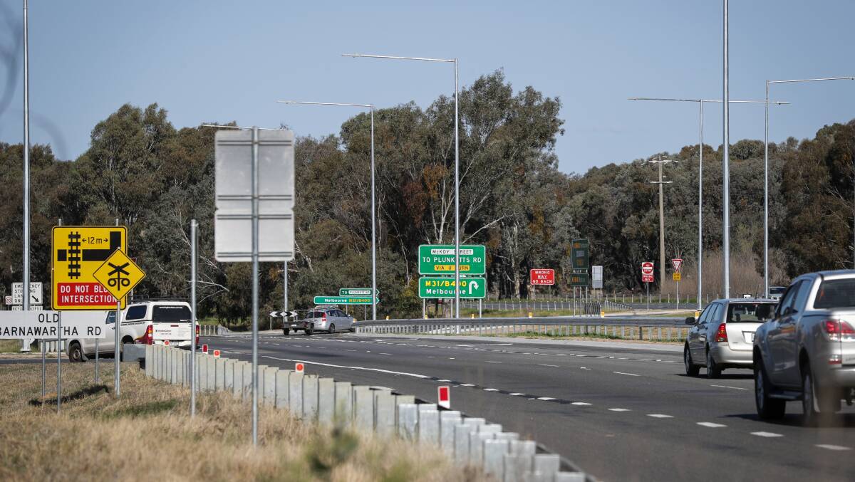 Open for traffic: A vehicle goes to loop across the northern end of the newly reconfigured Hume Freeway-McKoy Street intersection which was unveiled on Friday. Picture: JAMES WILTSHIRE