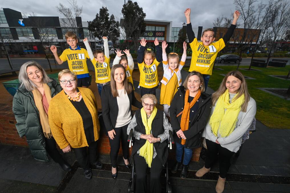 Support crew: Jacqui Hawkins surrounded by family in Wodonga's Junction Place after initiating her second campaign to win the seat of Benambra. Picture: MARK JESSER