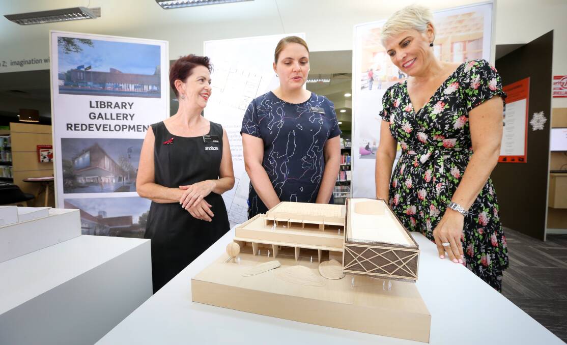 Shape of things to come: Library officer Leanne Boyd, art gallery team leader Justine Ambrosio and mayor Anna Speedie admire model showing how Wodonga's new library and Artspace will appear when completed.