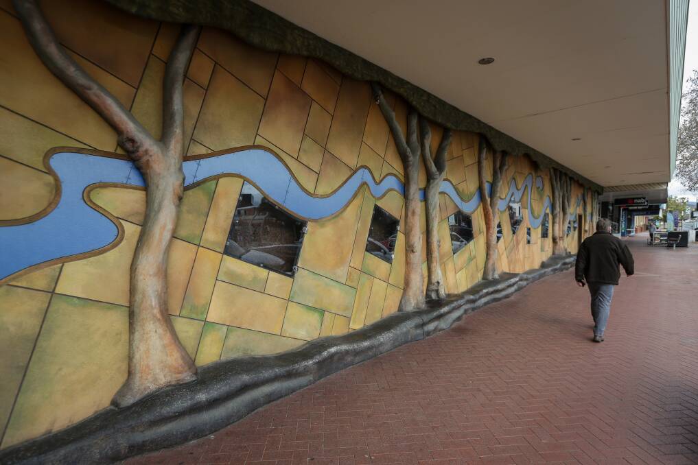 Colourful art: The mural known as Reflections on High which graces the exterior of the former Coles supermarket in central Wodonga. Picture: JAMES WILTSHIRE