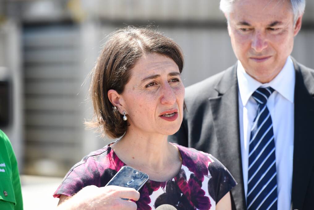 Changing times: NSW Premier Gladys Berejiklian with the retiring member for Albury during a trip to the Border last year. She has backed a plan to not have her party contest the seat of Wagga next year.